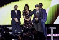 Nathan Fielder accepting an award for The Rehearsal in 2023 (Image via Getty)